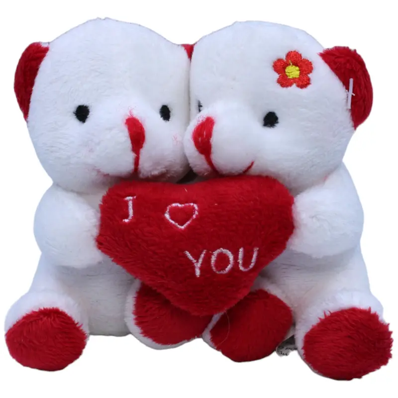Zwei weiße Teddybären mit Herz
